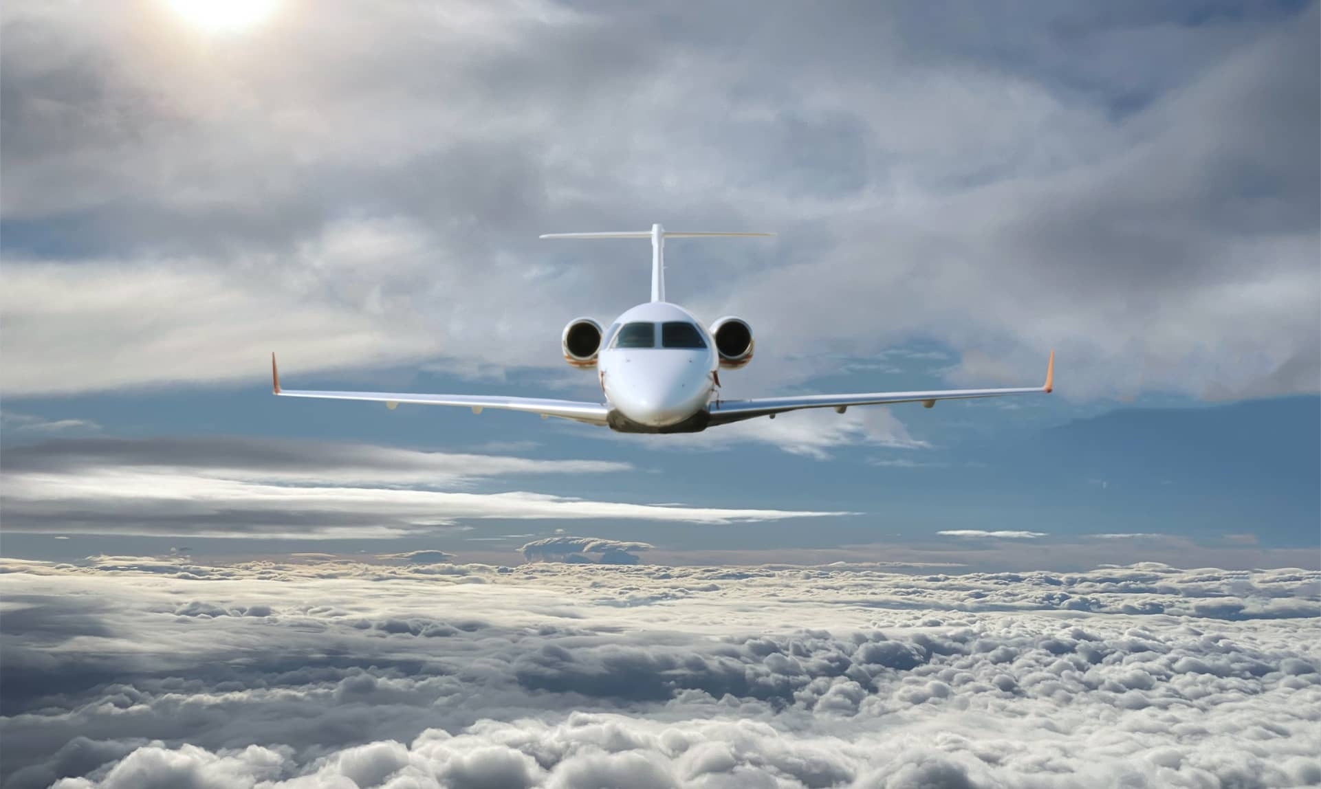 jet flying above clouds